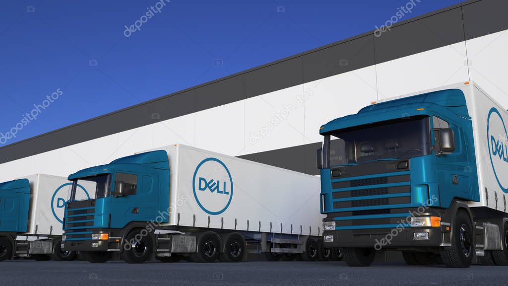 Freight semi trucks with Dell Inc. logo loading or unloading at warehouse dock. Editorial 3D