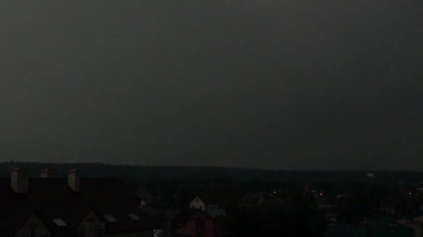 Super slow motion shot of a spectacular multiple lightning strikes in residential area at night — Stock Video