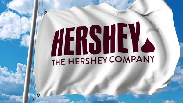 Розмахуючи прапором з логотипом компанії Hershey. Editoial 3d візуалізації — стокове фото