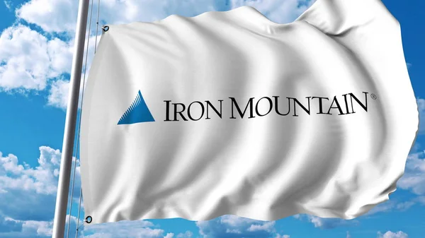 Розмахував прапором з логотипом заліза гори. Editoial 3d візуалізації — стокове фото