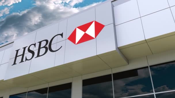 HSBC logó a modern épület homlokzatát. Szerkesztői 3d-leképezés — Stock videók