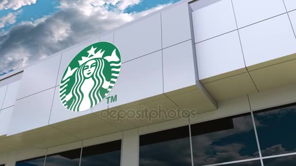 Starbucks-logo op de gevel van het modern gebouw. Redactioneel 3D-rendering — Stockvideo
