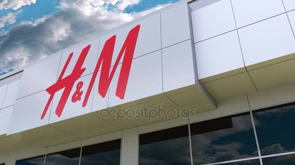 H M logo sulla facciata dell'edificio moderno. Rendering editoriale 3D — Video Stock