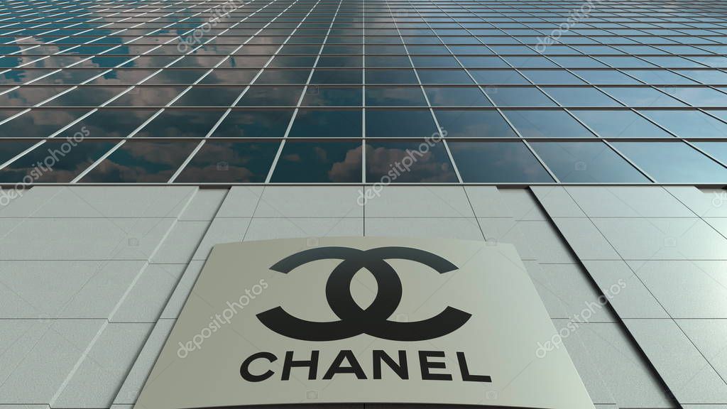 Outdoor signage board with Chanel logo. Modern office building. Editorial 3D