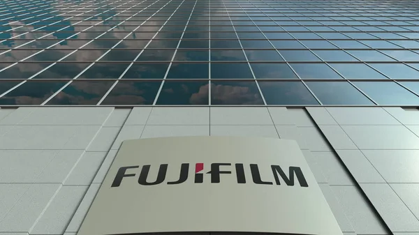 Σήμανση σκάφους με Fujifilm λογότυπο. Μοντέρνο γραφείο πρόσοψη του κτιρίου. Συντακτική 3d rendering — Φωτογραφία Αρχείου