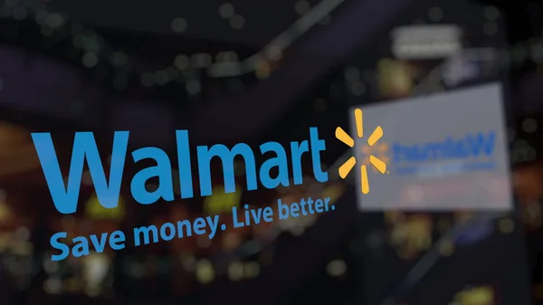 Logotipo Walmart no vidro contra o centro de negócios desfocado. Renderização 3D editorial — Fotografia de Stock