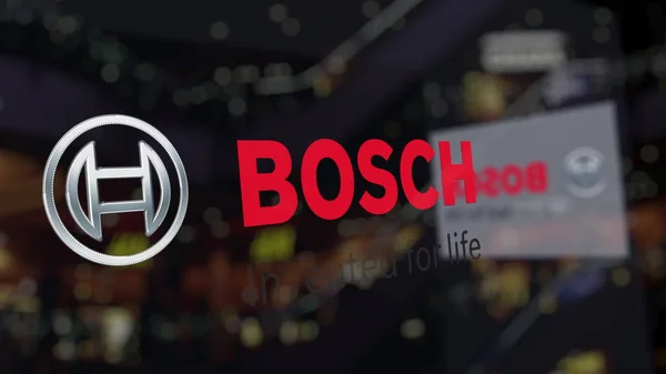 Robert Bosch Gmbh logo na sklo proti rozmazané business centrum. Úvodník 3d vykreslování — Stock fotografie