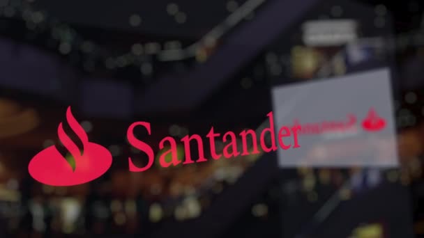 Santander Serfin logotipo no vidro contra o centro de negócios desfocado. Renderização 3D editorial — Vídeo de Stock