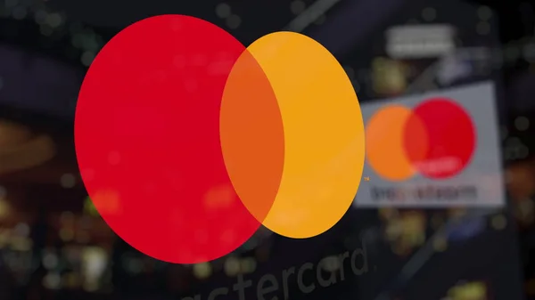 Logo MasterCard sur le verre contre le centre d'affaires flou. Editorial rendu 3D — Photo