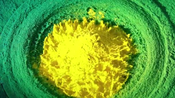 Loudspeaker throws yellow and green powder in the air, super slow motion shot. Music, Brazil, festival or party concepts — Stock Video