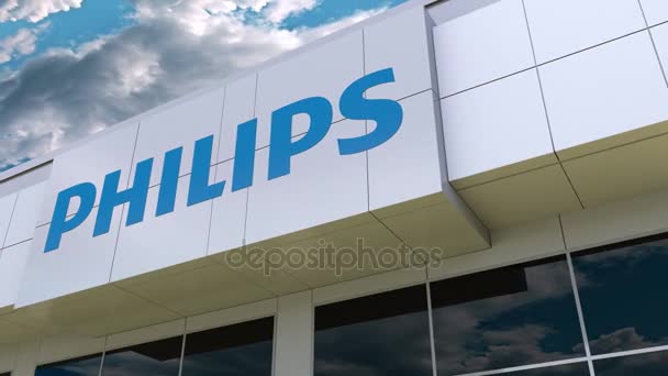 Логотип Philips на фасаде современного здания. Редакционная 3D рендеринг — стоковое видео