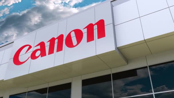 Canon Inc. logó a modern épület homlokzatát. Szerkesztői 3d-leképezés — Stock videók