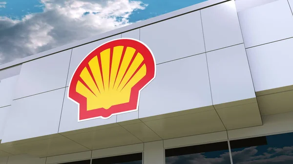 Η εταιρεία πετρελαίου Shell λογότυπο στην πρόσοψη πολυκατοικίας. Συντακτική 3d rendering — Φωτογραφία Αρχείου