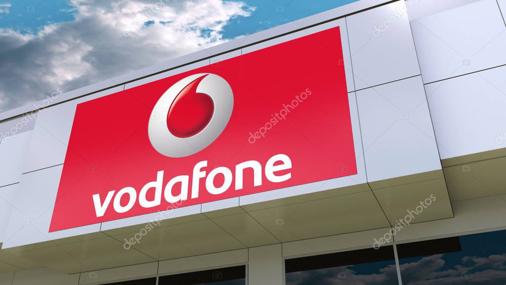 Vodafone logo on the modern building facade. Editorial 3D