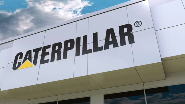 Caterpillar Inc. logó a modern épület homlokzatát. Szerkesztői 3d-leképezés — Stock Fotó