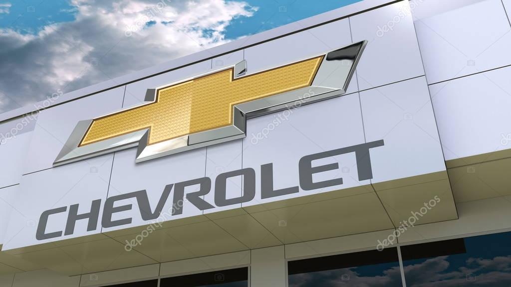 Chevrolet logo on the modern building facade. Editorial 3D