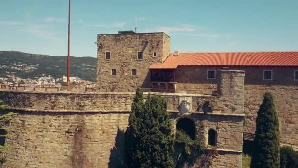 Aerial rising shot of an ancient fortress in Trieste, Italy — Stock Video