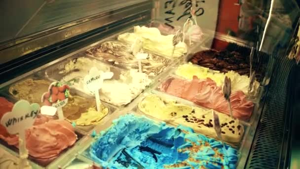 Colorful ice cream showcase in a tourist place — Stock Video