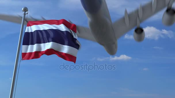 Commercial airplane landing behind waving Thai flag. Travel to Thailand conceptual animation — Stock Video