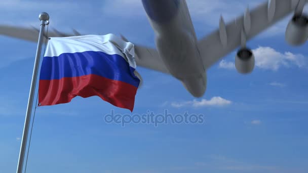 Commercial airplane landing behind waving Russian flag. Travel to Russia conceptual animation — Stock Video