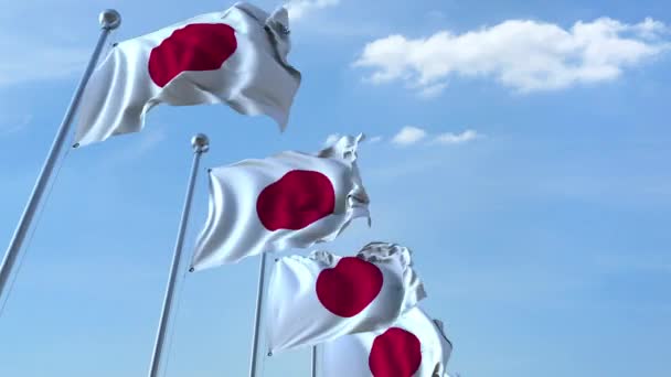 Fila di bandiere sventolanti del Giappone agaist cielo blu, anello senza soluzione di continuità — Video Stock