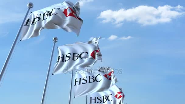 Wapperende vlaggen met Hsbc logo tegen hemel, naadloze loops. 4 k redactionele animatie — Stockvideo