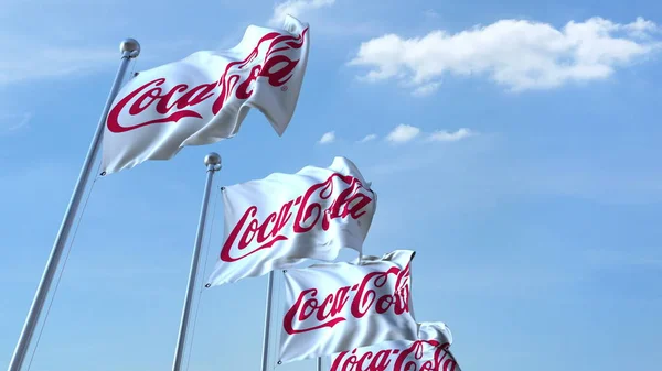 Waving flags with Coca-Cola logo against sky, editorial 3D rendering — Stok Foto