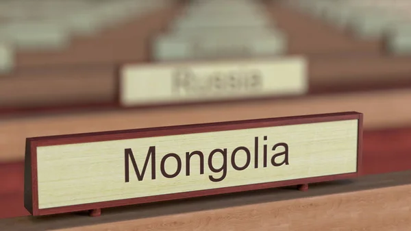 Mongolia znak nazwy wśród różnych krajach tablice w międzynarodowej organizacji. renderowania 3D — Zdjęcie stockowe