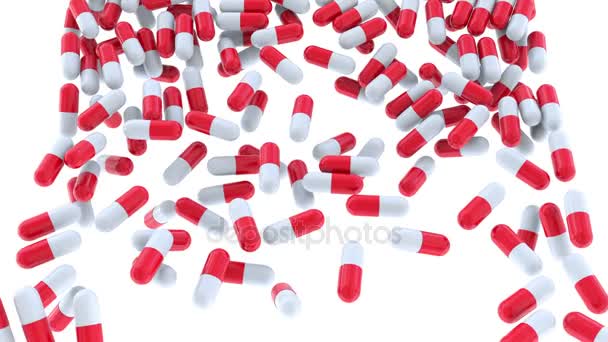 Pouring red and white drug capsules or pills — Stock Video