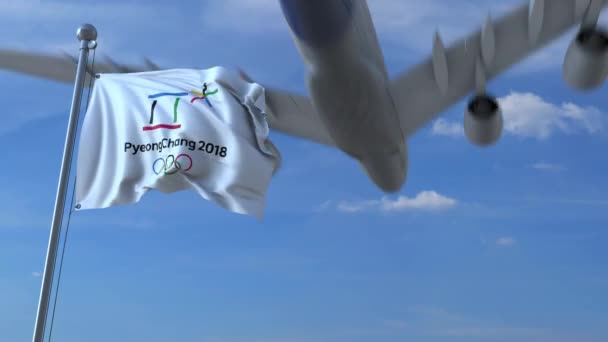 2018 と旗を振って韓国を越え大きな商業飛行機冬オリンピック 2018 ロゴ。4 k 編集アニメーション — ストック動画