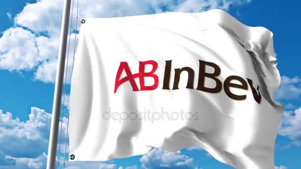 Waving flag with Anheuser-Busch InBev logo against clouds and sky. 4K editorial animation — Stock Video