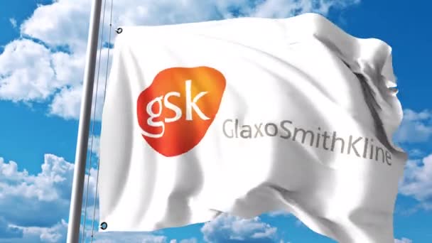 Bandiera sventolante con logo GlaxoSmithKline GSK contro nuvole e cielo. Animazione editoriale 4K — Video Stock