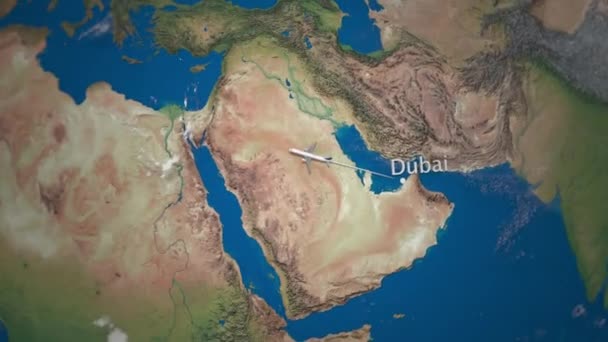Route of commercial airplane flying from Dubai to New York on the Earth globe. International trip intro animation — Stock Video