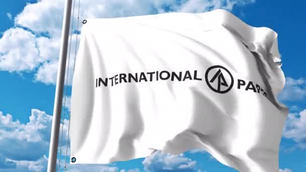 Acenando bandeira com logotipo da International Paper Company contra nuvens e céu. Animação editorial 4K — Vídeo de Stock