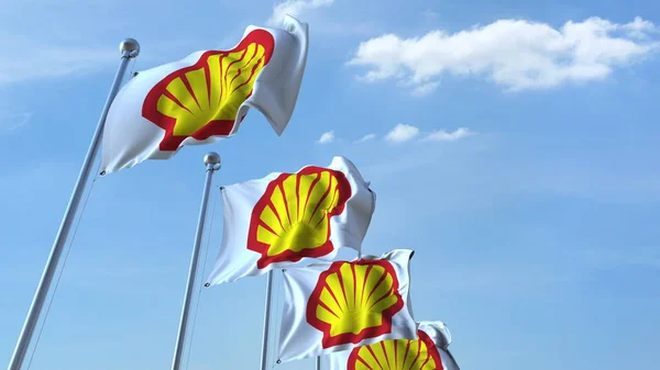 Flaggen schwenken mit Shell-Logo gegen den Himmel, Editorial 3D Rendering — Stockfoto