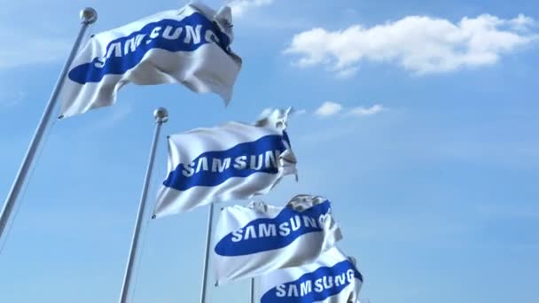 Κυματίζοντας σημαιών με Samsung λογότυπο κατά ουρανό, αδιάλειπτη βρόχο. 4 k σύνταξης κινούμενα σχέδια — Αρχείο Βίντεο