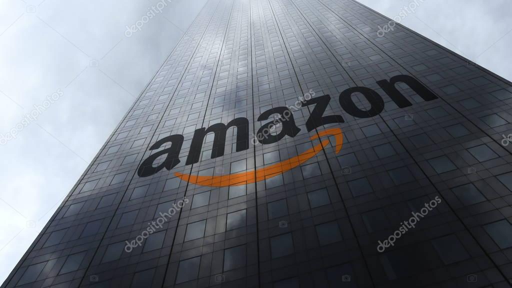 Amazon.com logo on a skyscraper facade reflecting clouds. Editorial 3D