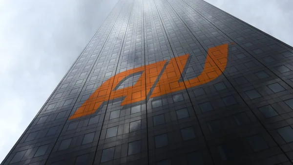 Logo společnosti au mobilních telefonů na mrakodrap fasádu odrážející mraky. Úvodník 3d vykreslování — Stock fotografie