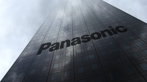 Logotipo de Panasonic Corporation en una fachada de rascacielos que refleja las nubes. Representación Editorial 3D — Foto de Stock