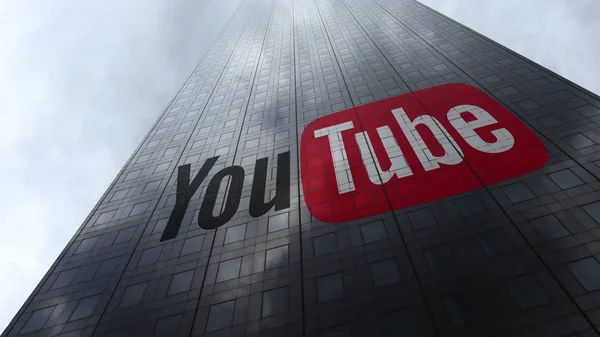 YouTube logo on a skyscraper facade reflecting clouds. Editorial 3D rendering — Stock Photo, Image