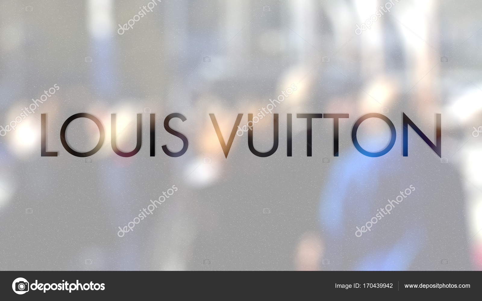 Louis Vuitton logo on a glass against blurred crowd on the steet