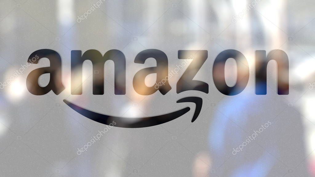 Amazon.com logo on a glass against blurred crowd on the steet. Editorial 3D