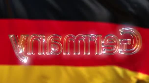 Вращающаяся стеклянная подпись Германии против размахивания германским флагом. Циклический фон движения или интро анимация — стоковое видео
