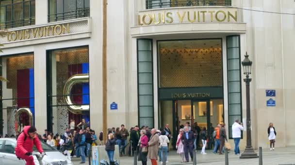 PARIS, FRANCE - OCTOBER 7, 2017. Luxury Louis Vuitton store on Champs- Elysees street Stock Video Footage by ©alexeynovikov #170683394