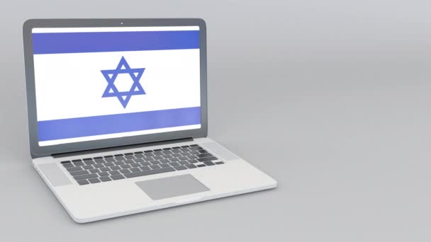 Apertura e chiusura computer portatile con bandiera di Israele sullo schermo. Servizio turistico, pianificazione dei viaggi o concetti di studio culturale — Video Stock