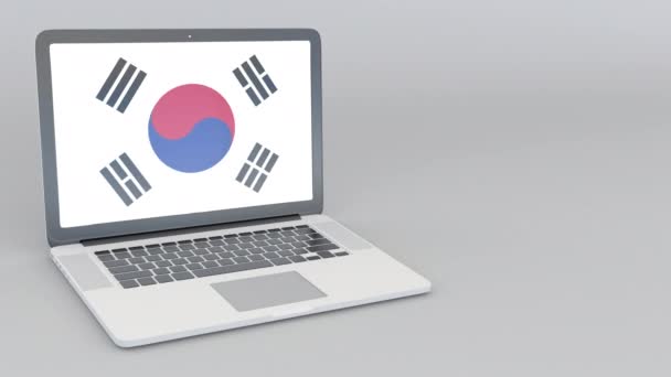 Açılış ve kapanış ile Güney Kore bayrağı ekran dizüstü bilgisayar. Turistik hizmet, seyahat planlaması veya kültürel çalışma kavramları — Stok video