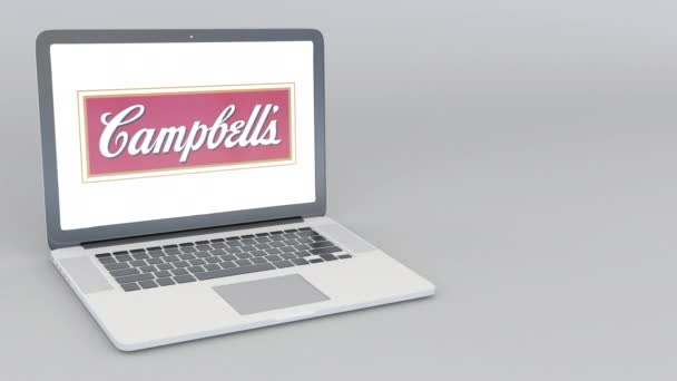 Ordinateur portable d'ouverture et de fermeture avec logo Campbell Soup Company. Animation éditoriale 4K — Video