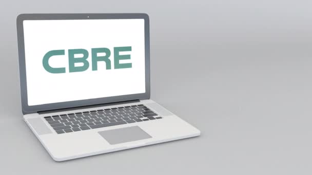 Openen en sluiten van laptop met Cbre Groepslogo. 4 k redactionele animatie — Stockvideo