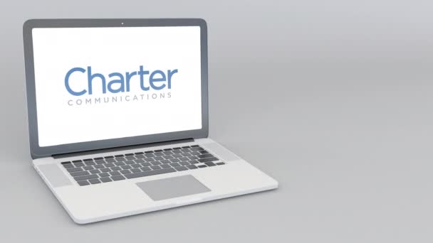 Öppna och stänga laptop med Charter Communications logotyp. 4 k redaktionella animation — Stockvideo