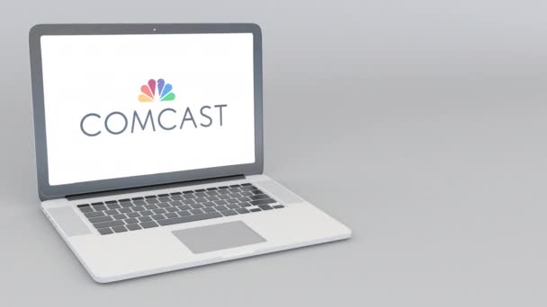 Laptop öffnen und schließen mit Comcast-Logo. 4k redaktionelle Animation — Stockvideo